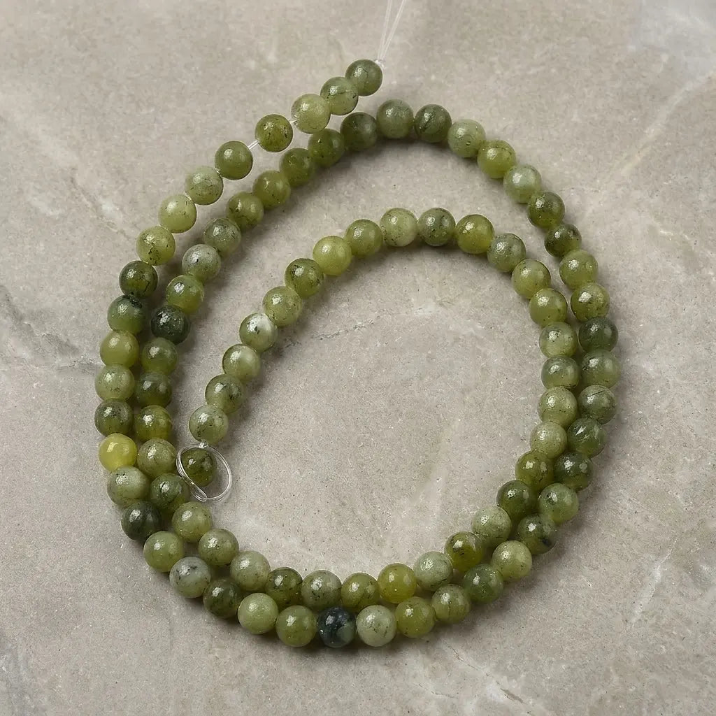 Natural Southern Jade Strand Beads - 4mm to 10mm