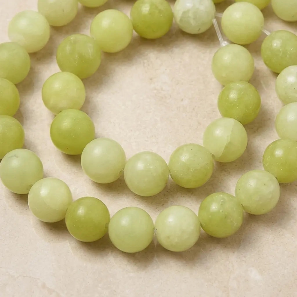 Strands of 4A Mountain Jade Beads - 4 mm to 10 mm