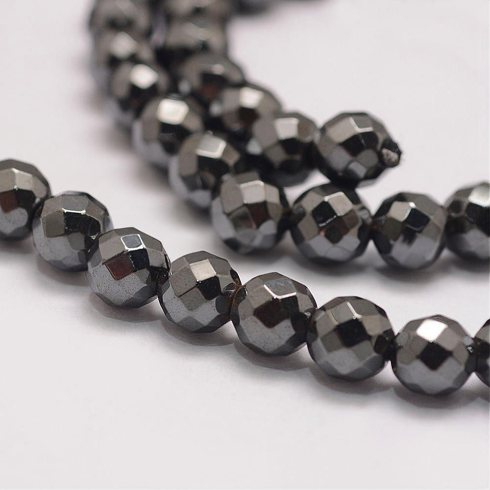 Perles Brins d'hématite synthétique à facettes- 6 mm 8 mm