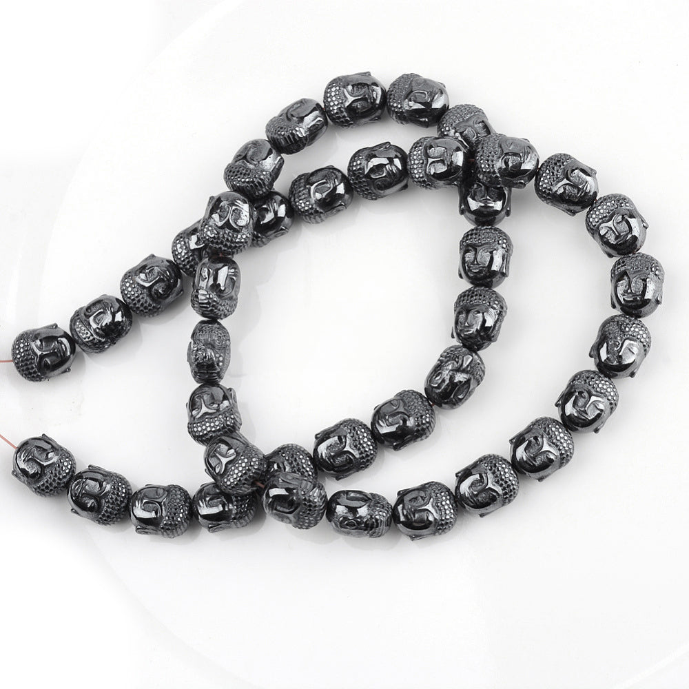 Perles Brins d'hématite synthétique forme tête de bouddah - 10x8.5~9x7mm